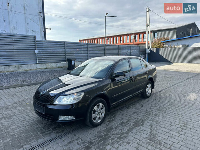 Черный Шкода Октавия, объемом двигателя 2 л и пробегом 239 тыс. км за 7800 $, фото 3 на Automoto.ua