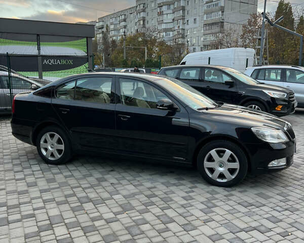 Шкода Октавія 2011 у Белой Церкве на Automoto.ua Чорний Шкода Октавія, об'ємом двигуна 1.4 л та пробігом 239 тис. км за 8300 $, фото 6 на Automoto.ua
