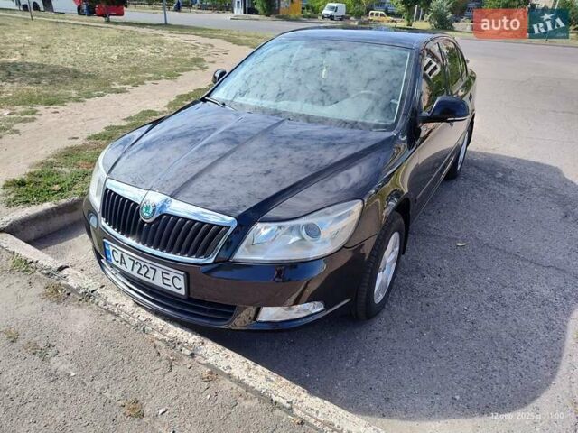Черный Шкода Октавия, объемом двигателя 1.6 л и пробегом 149 тыс. км за 10500 $, фото 7 на Automoto.ua