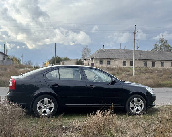 Чорний Шкода Октавія, об'ємом двигуна 1.4 л та пробігом 116 тис. км за 9302 $, фото 2 на Automoto.ua