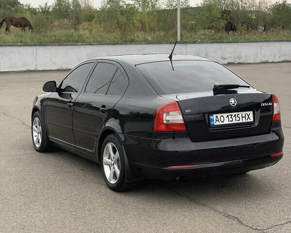 Чорний Шкода Октавія, об'ємом двигуна 1.6 л та пробігом 298 тис. км за 7999 $, фото 5 на Automoto.ua