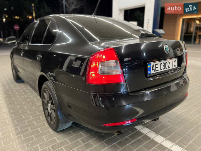 Шкода Октавія 2011 у Дніпро (Дніпропетровську) на Automoto.ua Чорний Шкода Октавія, об'ємом двигуна 1.6 л та пробігом 215 тис. км за 8900 $, фото 6 на Automoto.ua