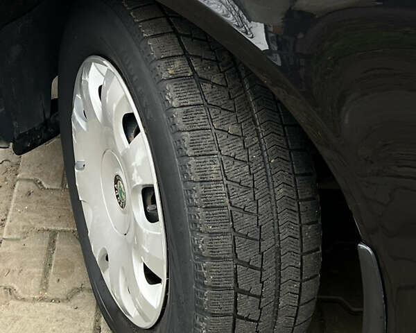 Черный Шкода Октавия, объемом двигателя 1.6 л и пробегом 216 тыс. км за 7300 $, фото 20 на Automoto.ua