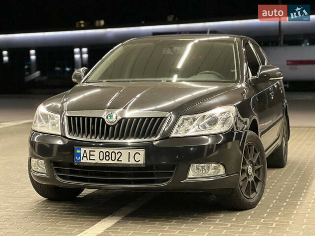 Шкода Октавія 2011 у Дніпро (Дніпропетровську) на Automoto.ua Чорний Шкода Октавія, об'ємом двигуна 1.6 л та пробігом 215 тис. км за 8900 $, фото 3 на Automoto.ua