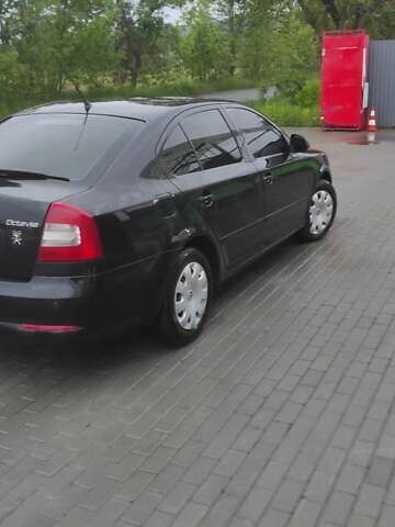 Шкода Октавия 2011 в Ужгороде на Automoto.ua Черный Шкода Октавия, объемом двигателя 1.6 л и пробегом 270 тыс. км за 7200 $, фото 12 на Automoto.ua