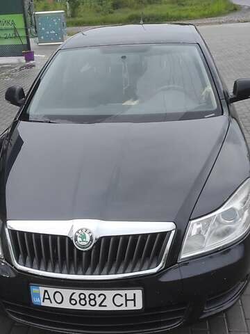 Шкода Октавия 2011 в Ужгороде на Automoto.ua Черный Шкода Октавия, объемом двигателя 1.6 л и пробегом 270 тыс. км за 7200 $, фото 6 на Automoto.ua