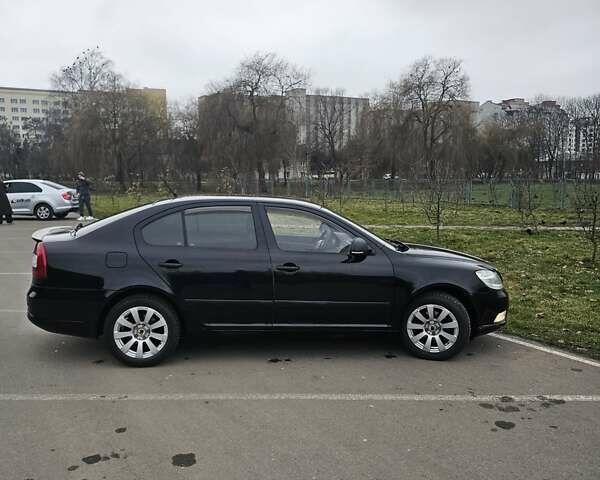 Черный Шкода Октавия, объемом двигателя 1.4 л и пробегом 207 тыс. км за 7500 $, фото 2 на Automoto.ua