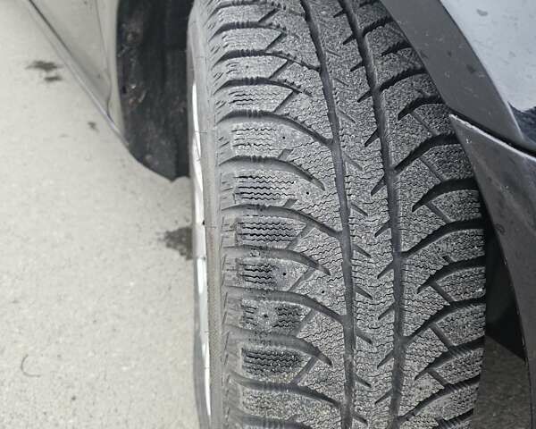 Черный Шкода Октавия, объемом двигателя 1.4 л и пробегом 207 тыс. км за 7500 $, фото 12 на Automoto.ua