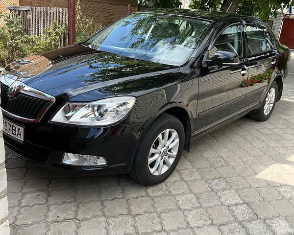 Чорний Шкода Октавія, об'ємом двигуна 1.8 л та пробігом 39 тис. км за 13000 $, фото 1 на Automoto.ua