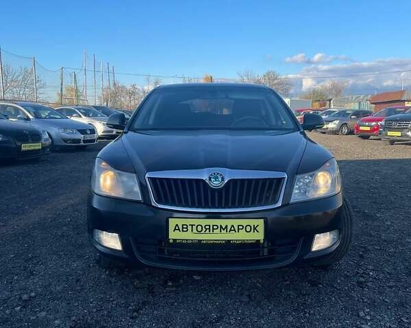 Чорний Шкода Октавія, об'ємом двигуна 1.8 л та пробігом 222 тис. км за 6790 $, фото 1 на Automoto.ua