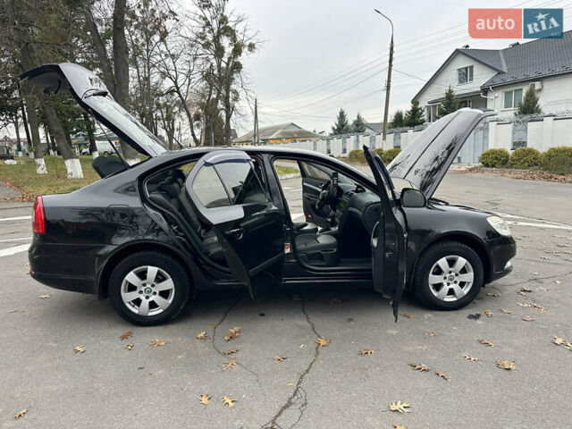 Черный Шкода Октавия, объемом двигателя 1.6 л и пробегом 175 тыс. км за 8300 $, фото 50 на Automoto.ua