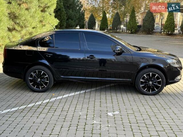Шкода Октавія 2012 у Одесі на Automoto.ua Чорний Шкода Октавія, об'ємом двигуна 1.97 л та пробігом 41 тис. км за 16200 $, фото 26 на Automoto.ua