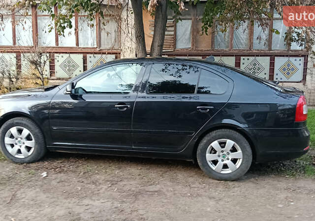 Черный Шкода Октавия, объемом двигателя 1.6 л и пробегом 220 тыс. км за 11500 $, фото 6 на Automoto.ua