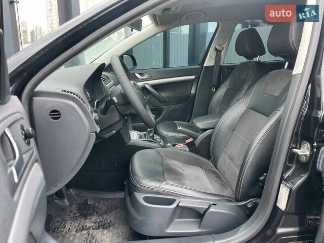 Черный Шкода Октавия, объемом двигателя 1.8 л и пробегом 159 тыс. км за 7990 $, фото 8 на Automoto.ua