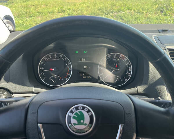 Шкода Октавия 2012 в Бережанах на Automoto.ua Черный Шкода Октавия, объемом двигателя 1.6 л и пробегом 308 тыс. км за 9200 $, фото 34 на Automoto.ua