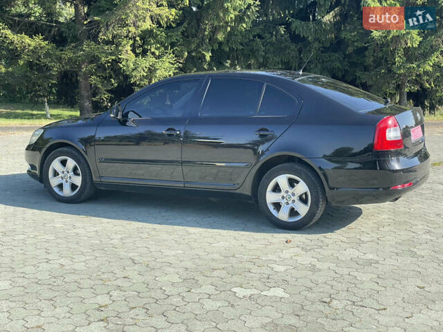 Чорний Шкода Октавія, об'ємом двигуна 2 л та пробігом 231 тис. км за 9950 $, фото 11 на Automoto.ua