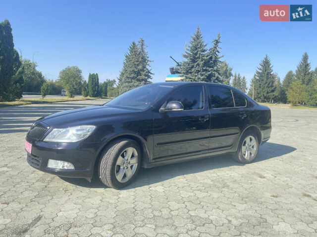 Чорний Шкода Октавія, об'ємом двигуна 2 л та пробігом 231 тис. км за 9950 $, фото 5 на Automoto.ua