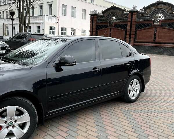 Черный Шкода Октавия, объемом двигателя 1.8 л и пробегом 255 тыс. км за 8900 $, фото 1 на Automoto.ua