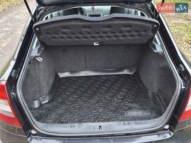 Шкода Октавия 2012 в Полтаве на Automoto.ua Черный Шкода Октавия, объемом двигателя 1.6 л и пробегом 146 тыс. км за 10000 $, фото 8 на Automoto.ua