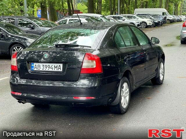 Черный Шкода Октавия, объемом двигателя 1.8 л и пробегом 230 тыс. км за 7200 $, фото 1 на Automoto.ua