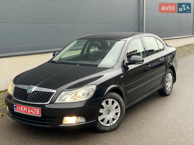 Чорний Шкода Октавія, об'ємом двигуна 1.6 л та пробігом 183 тис. км за 7999 $, фото 1 на Automoto.ua