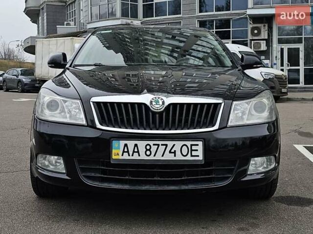 Чорний Шкода Октавія, об'ємом двигуна 2 л та пробігом 240 тис. км за 10900 $, фото 4 на Automoto.ua