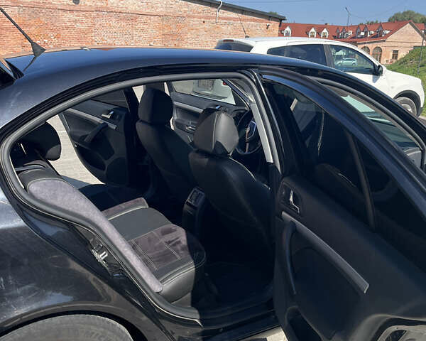 Шкода Октавия 2012 в Бережанах на Automoto.ua Черный Шкода Октавия, объемом двигателя 1.6 л и пробегом 308 тыс. км за 9200 $, фото 13 на Automoto.ua