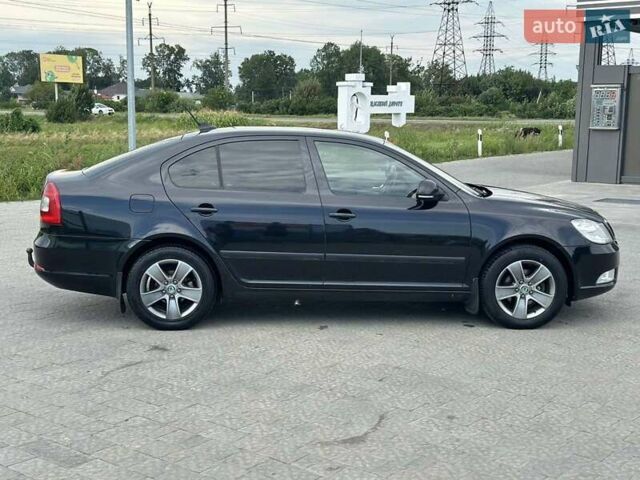 Шкода Октавия 2012 в Львове на Automoto.ua Черный Шкода Октавия, объемом двигателя 1.6 л и пробегом 283 тыс. км за 8300 $, фото 9 на Automoto.ua