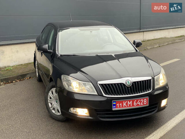 Чорний Шкода Октавія, об'ємом двигуна 1.6 л та пробігом 183 тис. км за 7999 $, фото 2 на Automoto.ua