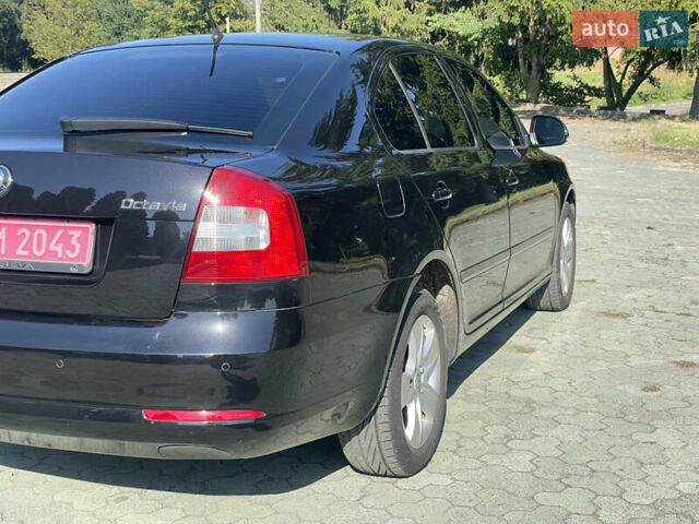 Чорний Шкода Октавія, об'ємом двигуна 2 л та пробігом 231 тис. км за 9950 $, фото 13 на Automoto.ua