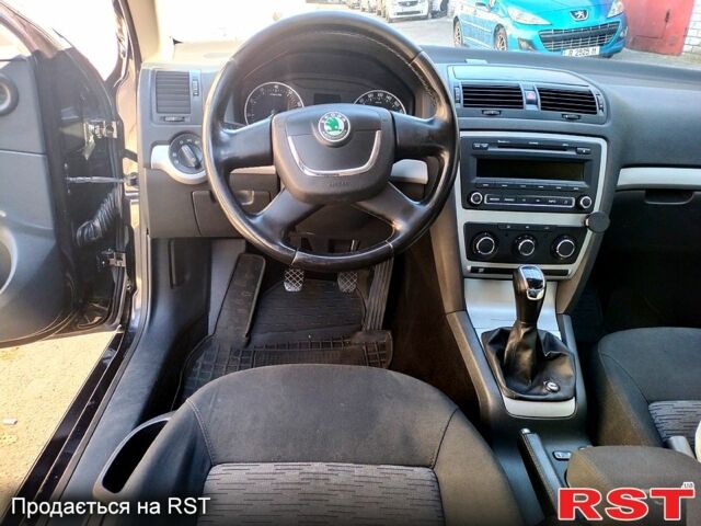 Черный Шкода Октавия, объемом двигателя 1.8 л и пробегом 247 тыс. км за 7350 $, фото 1 на Automoto.ua