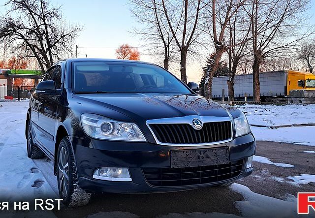 Черный Шкода Октавия, объемом двигателя 16 л и пробегом 87 тыс. км за 9300 $, фото 1 на Automoto.ua
