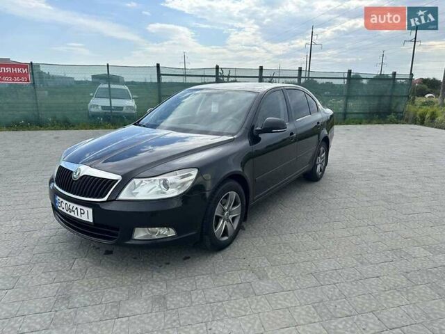 Шкода Октавия 2012 в Львове на Automoto.ua Черный Шкода Октавия, объемом двигателя 1.6 л и пробегом 283 тыс. км за 8300 $, фото 11 на Automoto.ua