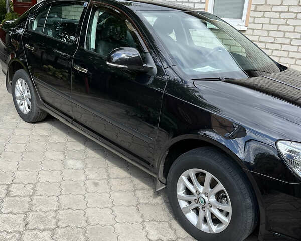 Чорний Шкода Октавія, об'ємом двигуна 1.8 л та пробігом 39 тис. км за 13000 $, фото 2 на Automoto.ua