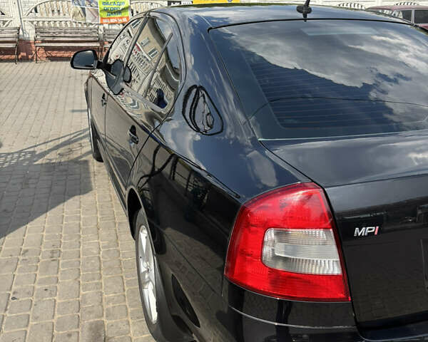 Чорний Шкода Октавія, об'ємом двигуна 1.6 л та пробігом 303 тис. км за 8100 $, фото 5 на Automoto.ua