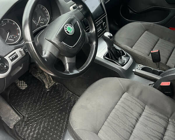 Шкода Октавія 2012 у Тальном на Automoto.ua Чорний Шкода Октавія, об'ємом двигуна 1.8 л та пробігом 325 тис. км за 7300 $, фото 12 на Automoto.ua