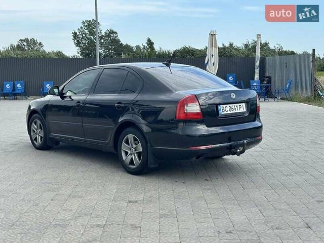 Шкода Октавия 2012 в Львове на Automoto.ua Черный Шкода Октавия, объемом двигателя 1.6 л и пробегом 283 тыс. км за 8300 $, фото 6 на Automoto.ua