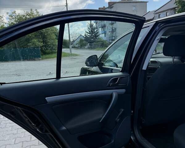 Чорний Шкода Октавія, об'ємом двигуна 1.6 л та пробігом 223 тис. км за 7450 $, фото 7 на Automoto.ua