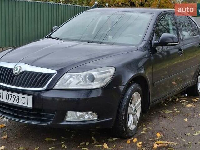 Шкода Октавия 2012 в Полтаве на Automoto.ua Черный Шкода Октавия, объемом двигателя 1.6 л и пробегом 146 тыс. км за 10000 $, фото 2 на Automoto.ua