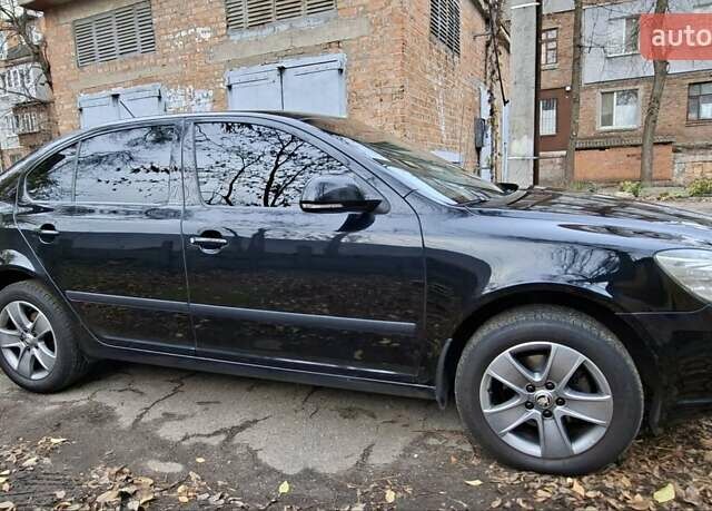 Черный Шкода Октавия, объемом двигателя 1.8 л и пробегом 173 тыс. км за 9400 $, фото 2 на Automoto.ua