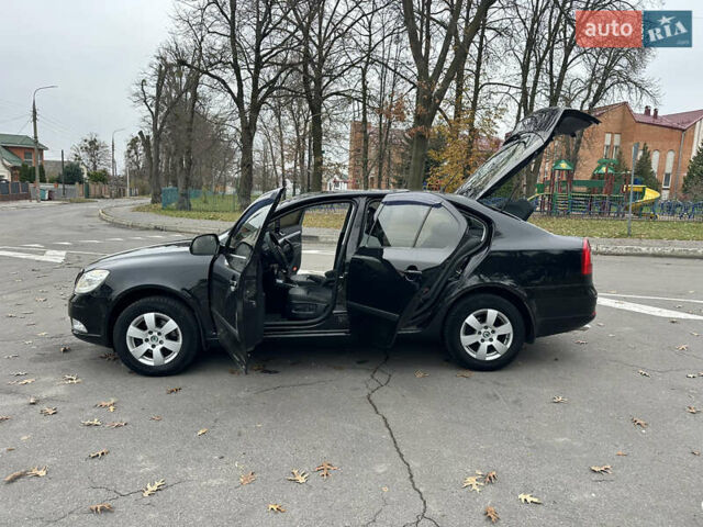 Черный Шкода Октавия, объемом двигателя 1.6 л и пробегом 175 тыс. км за 8300 $, фото 47 на Automoto.ua