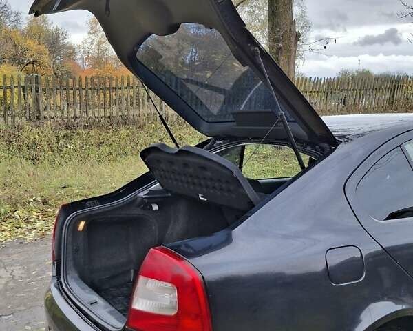 Шкода Октавия 2012 в Полтаве на Automoto.ua Черный Шкода Октавия, объемом двигателя 1.6 л и пробегом 146 тыс. км за 10000 $, фото 5 на Automoto.ua