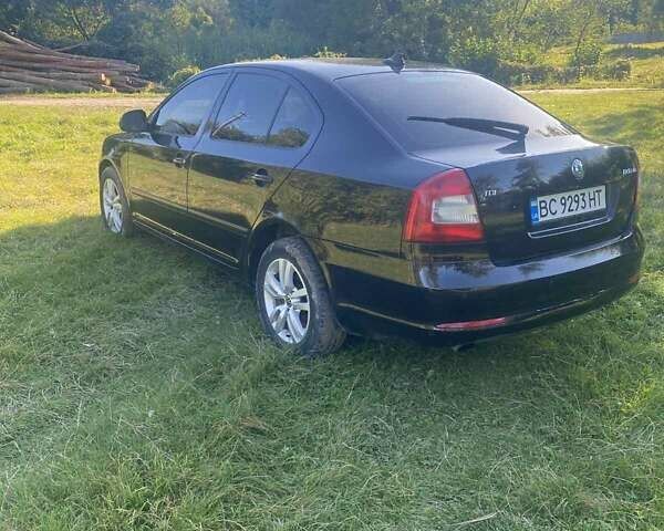 Черный Шкода Октавия, объемом двигателя 1.6 л и пробегом 230 тыс. км за 7700 $, фото 2 на Automoto.ua