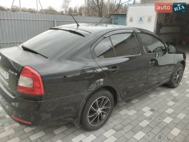 Чорний Шкода Октавія, об'ємом двигуна 1.8 л та пробігом 225 тис. км за 8600 $, фото 1 на Automoto.ua