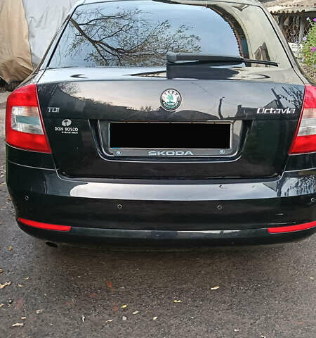Черный Шкода Октавия, объемом двигателя 1.6 л и пробегом 220 тыс. км за 11500 $, фото 7 на Automoto.ua