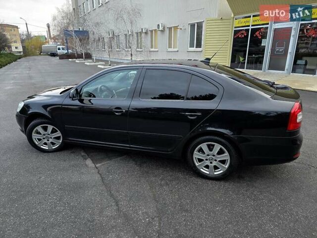 Черный Шкода Октавия, объемом двигателя 1.8 л и пробегом 215 тыс. км за 9400 $, фото 8 на Automoto.ua