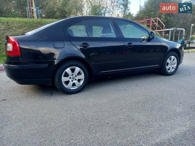 Черный Шкода Октавия, объемом двигателя 1.6 л и пробегом 236 тыс. км за 7750 $, фото 1 на Automoto.ua