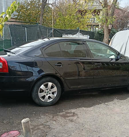 Черный Шкода Октавия, объемом двигателя 1.6 л и пробегом 220 тыс. км за 11500 $, фото 1 на Automoto.ua