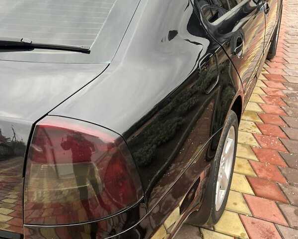 Шкода Октавія 2012 у Тальном на Automoto.ua Чорний Шкода Октавія, об'ємом двигуна 1.8 л та пробігом 325 тис. км за 7300 $, фото 2 на Automoto.ua