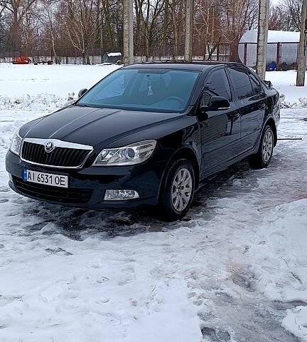 Чорний Шкода Октавія, об'ємом двигуна 1.8 л та пробігом 206 тис. км за 7200 $, фото 1 на Automoto.ua